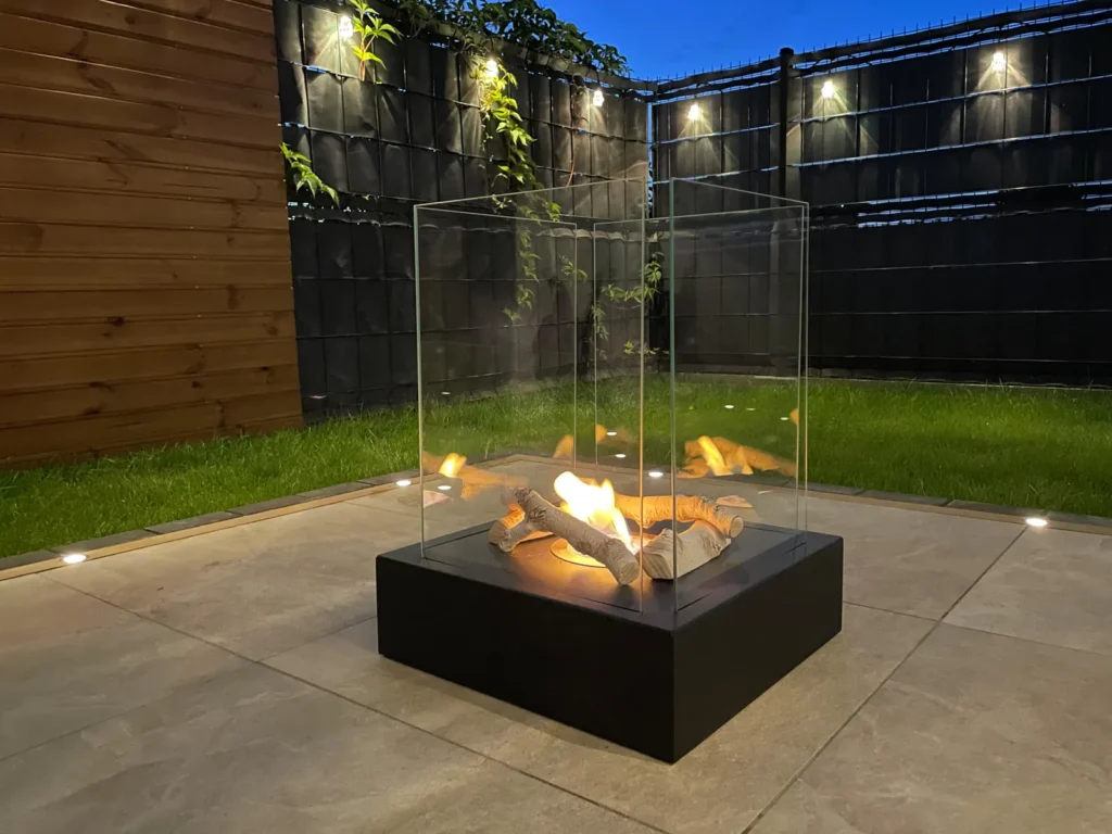 Sunset Garden Bioethanol Fireplace – Black in a home setting