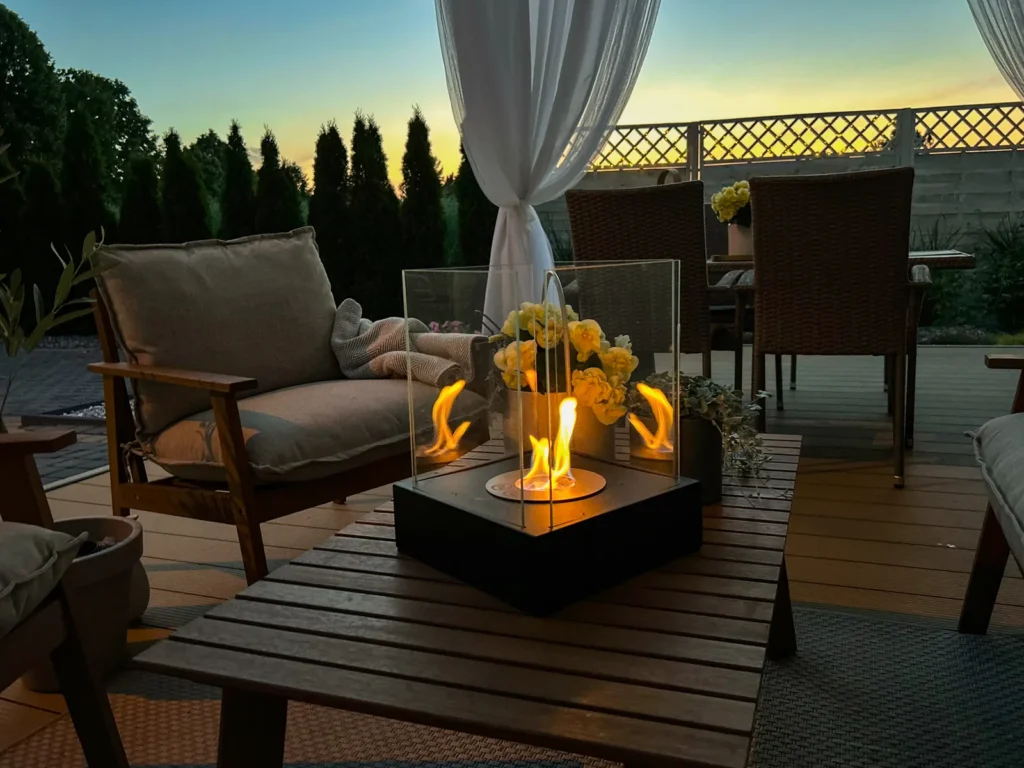 Sunset Garden Mini Bioethanol Fireplace – Black in a home setting